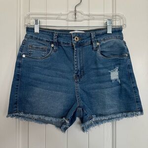 Woman’s Denim Frayed Hem Shorts